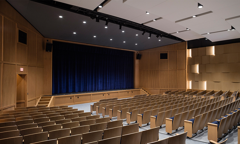 <p>Renovation of the Maguire Auditorium includes new seating, flooring, and improved lighting and acoustic finishes, dramatically enhancing the space’s look and function. The Auditorium is central to campus life and one of the first spaces that prospective families visit when they tour the campus.</p>
