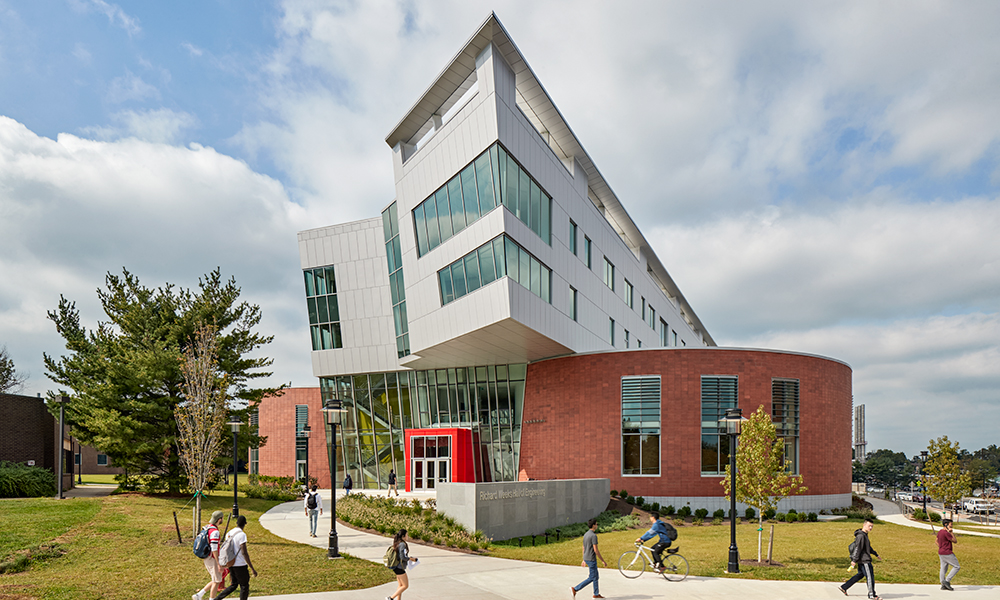 <p>The scale, form and materiality of the building relates purposefully to the rectilinear Biomedical Engineering Building at the west gateway to the new Quad; becoming dynamically angular moving towards the east entrance and first point of dramatic exposure on the loop road.</p>
