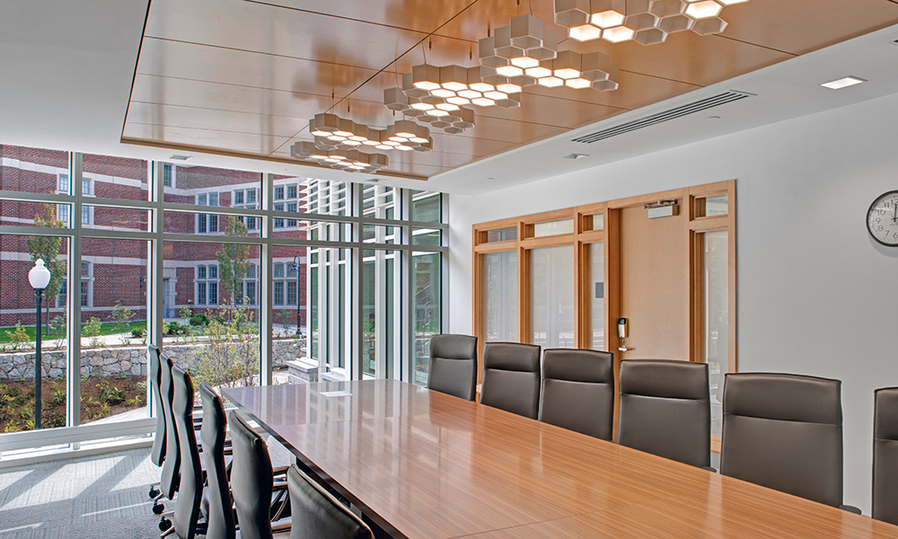 <p>The hexagonal light fixtures in the conference room illuminate to showcase nature’s favorite shape. </p>
