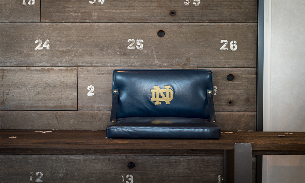 <p>An interesting interior application was the reuse of these salvaged benches from the stadium bowl. The weathered redwood benches with original seat numbers intact, provide an historic artifact applied to many interior spaces for all to enjoy when visiting each of the three new buildings.</p>

