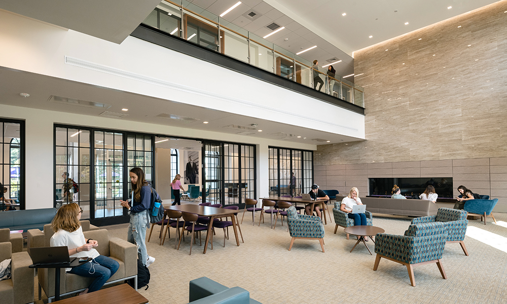 <p>A two-story great room with a 12 foot gas fireplace is open to the Stonehill community for study and social activity as well as for hosting guest speakers and other events.</p>
