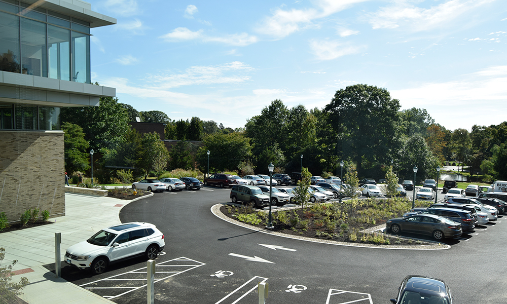 <p>This connection is further reinforced with the installation of sustainable stormwater management measures of a large rain garden within the porous asphalt parking lot, showcasing the University’s efforts of sustainability and commitment to the context of the larger community.  </p>
