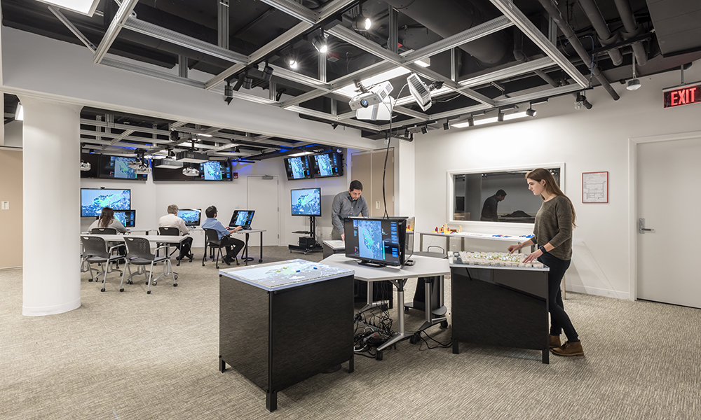 <p>SSRC includes a 2,500 SF high-tech VisLab that is modular and reconfigurable with movable wall partitions that can be used for various purposes including theatre, seminar, research, gaming and demo modes.</p>
