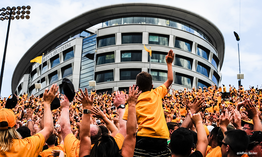 <p>Hawkeye fans pause after the first quarter of each football game and direct their energy and excitement to the hospitalized children through “The Wave,” a ritual that accentuates the important role this iconic building serves within the fabric of the city and the state of Iowa.</p>
