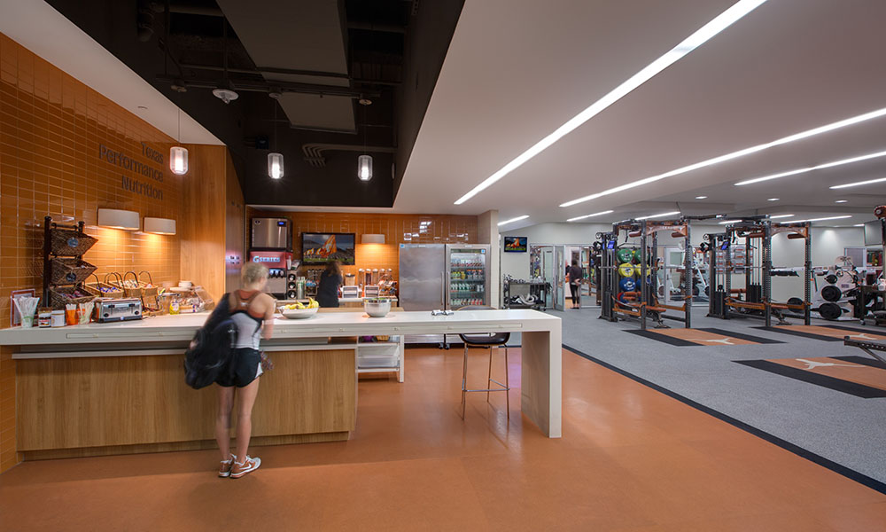<p>ATHLETIC NUTRITION CENTER</p>
<p>The Texas Athletic Nutrition Center (TANC) provides a multi-use venue that transitions from a day-to-day training table for student-athletes into a revenue generating club on Football gamedays. Located in the North End Zone, the TANC hosts over 500 student-athletes daily. With action stations for food and beverage service, interactive mobile and in-person food coaching, and a best-in-class nutrition staff, Texas athletes receive an empowering education to improve performance and overall health through proper fueling techniques.</p>
