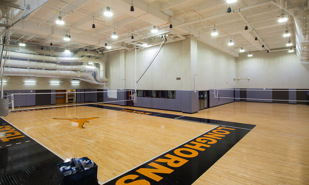 <p>VOLLEYBALL DEVELOPMENT CENTER</p>
<p>Opened in 2015, the new Volleyball Development Center converted 26,750 SF of shelled space 30’ beneath DKR-Texas Memorial Stadium into a world-class Women’s Volleyball practice facility and team hospitality area. </p>
