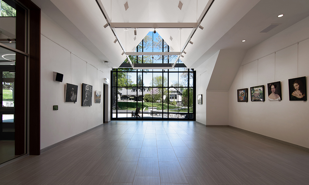 <p>The large Gallery, separated by lockable glass doors provides a highly visible display of creative work by students, faculty, alumni and local artists.</p>
