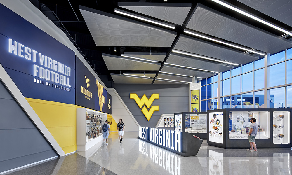 <p>New front door to the Puskar Center with an interactive Hall of Fame lobby to complement the history and legacy of WVU football.</p>
