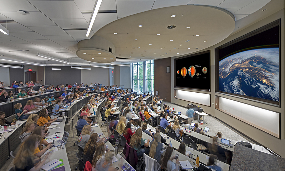 <p>250-seat Team-based Active Learning Classroom features the ‘flipped classroom’ model, which is set up for more interaction as opposed to a traditional lecture hall. Furniture allows students to easily switch from lecture mode to collaboration and group work. </p>
