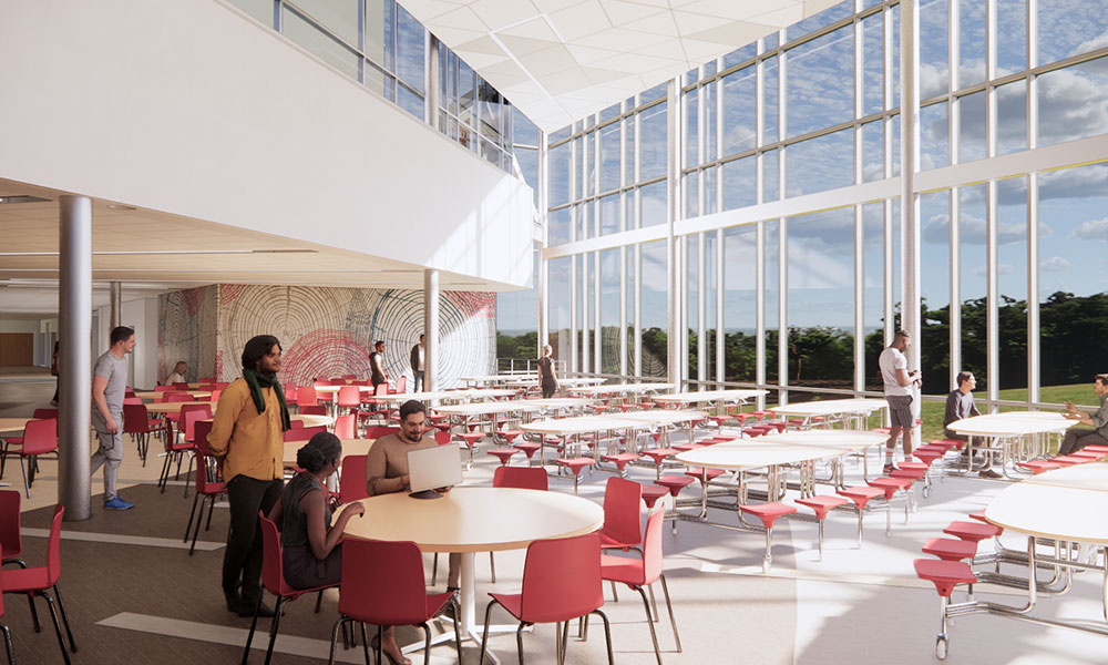 <p>A common servery supports unique dining spaces for the middle school and high school. Each has floor-to-ceiling glass and ample natural light.</p>
