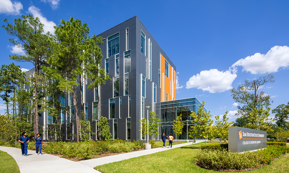 <p>The character of the site maintains a natural, wooded feeling with the building nestled into the landscape giving a distinctive character to the medical school in the midst of the surrounding commercial development.  The natural landscape helps create a sense of “campus” while providing a calming relief from what is often a very demanding and stressful program.</p>
