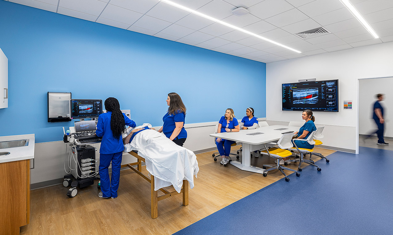 <p>Initially designed for debriefing, <span data-ogsc="rgb(0, 112, 192)">the size of the </span>room <span data-ogsc="rgb(0, 112, 192)">allows for more equipment and is </span>capable of supporting multiple learning activities, including live demonstrations, <span data-ogsc="rgb(0, 112, 192)">a third clinical exam room</span>, and hands-on instruction to maximize impact for all learners.</p>
