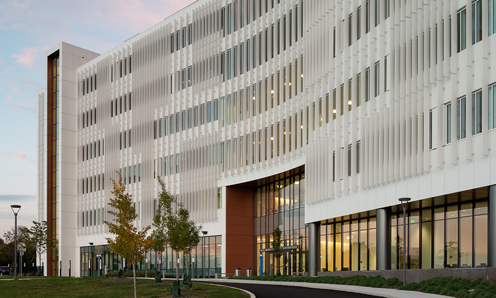 <p>Set at the top of a gentle rise from the street, the inviting two-story entry heightens the building’s visibility and civic presence, creating a strong first impression and a welcoming point of arrival for the campus community.</p>
