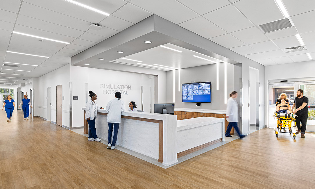 <p>The nurse’s station reflects real clinical practice, serving as a central hub where students can manage patient flow and communicate across teams. From here, they move directly into <span data-ogsb="aqua">a variety of potential simulated environments</span> including trauma<span data-ogsb="aqua">, ICU, labor & delivery, emergency, and/or patient rooms,</span> reinforcing a seamless transition from early response to acute care, while strengthening clinical judgment in high-pressure situations.<strong><br />
</strong></p>
